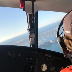 Pilot on the move l Helicopter Tour Dubai l Dubai Helicopter Tour l Book A Helicopter Tour l Aerial Ride in Dubai l Helicopter Tour Over Dubai l Helicopter ride in Dubai